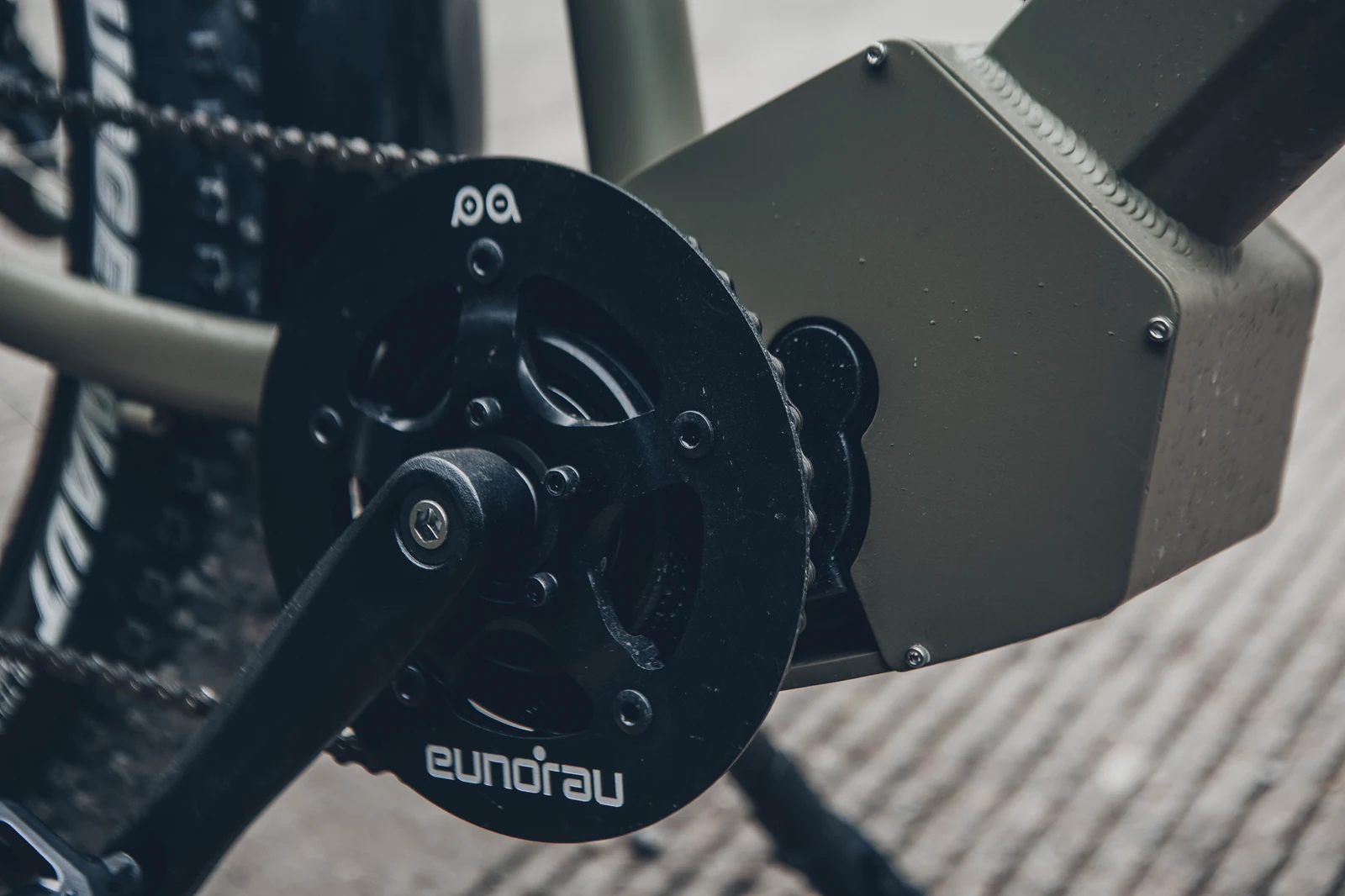 Close-up of the EUNORAU FAT-HD 1.0 Pro Bafang mid-drive motor and crank area